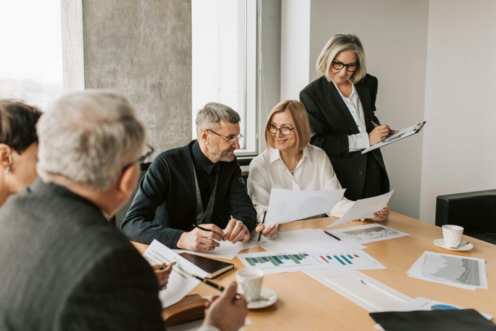 People at table looking at documents
